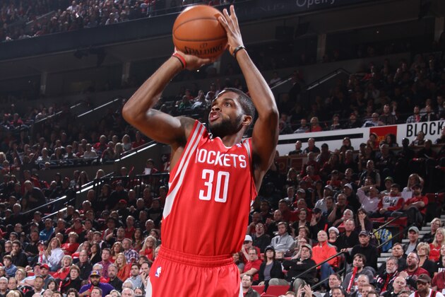 PORTLAND, OR - APRIL 27: Troy Daniels #30 of the Houston Rockets shoots against the Portland Trail Blazers in Game Four of the Western Conference Quarterfinals during the 2014 NBA Playoffs on April 27, 2014 at the Moda Center in Portland, Oregon. NOTE TO USER: User expressly acknowledges and agrees that, by downloading and or using this photograph, User is consenting to the terms and conditions of the Getty Images License Agreement. Mandatory Copyright Notice: Copyright 2014 NBAE (Photo by Sam Forencich/NBAE via Getty Images)