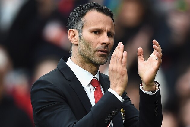 MANCHESTER, ENGLAND - APRIL 26:  Ryan Giggs of Manchester United applauds the fans after a rousing victory in his first match as manager during the Barclays Premier League match between Manchester United and Norwich City at Old Trafford on April 26, 2014 in Manchester, England.  (Photo by Laurence Griffiths/Getty Images)