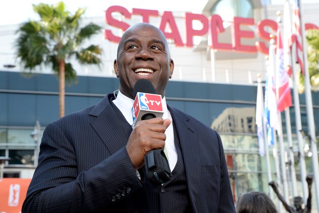 LOS ANGELES, CA - FEBRUARY 5:  Earvin 'Magic' Johnson poses for a picture during a press conference to announce his purchase of the Los Angeles Sparks at STAPLES Center on February 5, 2014 in Los Angeles, California. NOTE TO USER: User expressly acknowledges and agrees that, by downloading and/or using this Photograph, user is consenting to the terms and conditions of the Getty Images License Agreement. Mandatory Copyright Notice: Copyright 2014 NBAE (Photo by Andrew D. Bernstein/NBAE via Getty Images)