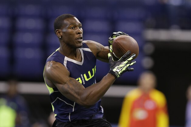 USC wide receiver Marqise Lee makes a catch during a drill at the NFL football scouting combine in Indianapolis, Sunday, Feb. 23, 2014. (AP Photo/Michael Conroy) USC wide receiver Marqise Lee makes a catch during a drill at the NFL football scouting combine in Indianapolis, Sunday, Feb. 23, 2014. (AP Photo/Michael Conroy)