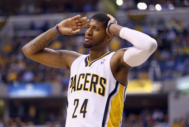 INDIANAPOLIS, IN - APRIL 28:  Paul George #24 of the Indiana Pacers disagrees with an officals call in the game 107-97 loss to the Atlanta Hawks in Game 5 of the Eastern Conference Quarterfinals during the 2014 NBA Playoffs at Bankers Life Fieldhouse on April 28, 2014 in Indianapolis, Indiana. NOTE TO USER: User expressly acknowledges and agrees that, by downloading and or using this photograph, User is consenting to the terms and conditions of the Getty Images License Agreement.  (Photo by Andy Lyons/Getty Images)