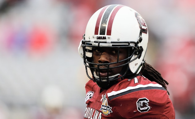 ORLANDO, FL - JANUARY 01:  Jadeveon Clowney #7 of the South Carolina Gamecocks works out on the field before the start of their game against the Wisconsin Badgers at the Capital One Bowl on January 1, 2014 in Orlando, Florida.  (Photo by Scott Halleran/Getty Images)