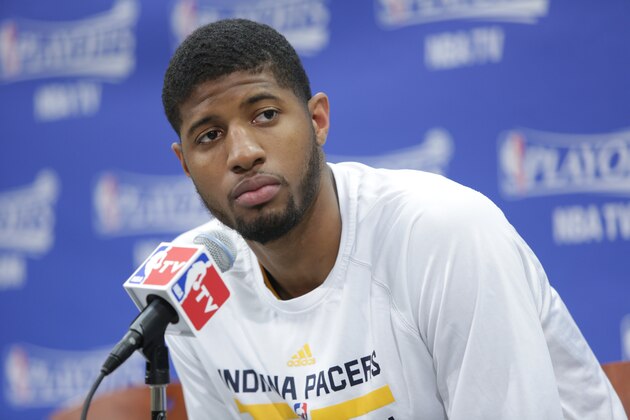 INDIANAPOLIS - APRIL 28: Paul George #24 of the Indiana Pacers addresses the media after a game against the Atlanta Hawks in Game Five of the Eastern Conference Quarterfinals at Bankers Life Fieldhouse on April 28, 2014 in Indianapolis, Indiana.  NOTE TO USER: User expressly acknowledges and agrees that, by downloading and or using this Photograph, user is consenting to the terms and condition of the Getty Images License Agreement. Mandatory Copyright Notice: 2014 NBAE  (Photo by Ron Hoskins/NBAE via Getty Images)