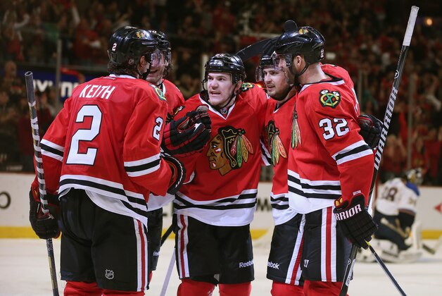 CHICAGO, IL - APRIL 27: (L-R) Duncan Keith #2, Brandon Saad #20, Andrew Shaw #65, Marcus Kruger #16 and Michal Rozsival #32 of the Chicago Blackhawks celebrate a third period goal by Shaw against the St. Louis Blues in Game Six of the First Round of the 2014 NHL Stanley Cup Playoffs at the United Center on April 27, 2014 in Chicago, Illinois. The Blackhawks defeated the Blues 5-1 to win the series four games to two. (Photo by Jonathan Daniel/Getty Images) CHICAGO, IL - APRIL 27: (L-R) Duncan Keith #2, Brandon Saad #20, Andrew Shaw #65, Marcus Kruger #16 and Michal Rozsival #32 of the Chicago Blackhawks celebrate a third period goal by Shaw against the St. Louis Blues in Game Six of the First Round of the 2014 NHL Stanley Cup Playoffs at the United Center on April 27, 2014 in Chicago, Illinois. The Blackhawks defeated the Blues 5-1 to win the series four games to two. (Photo by Jonathan Daniel/Getty Images)