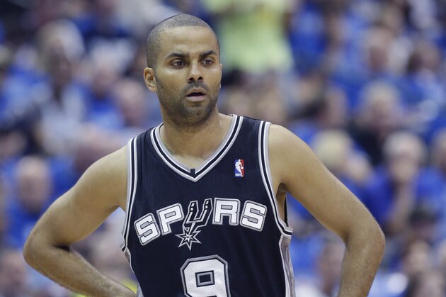 San Antonio Spurs guard Tony Parker (9) of France looks on during the first half of Game 3 of an NBA basketball first-round playoff series against the Dallas Mavericks in Dallas, Saturday, April 26, 2014. (AP Photo/LM Otero)
