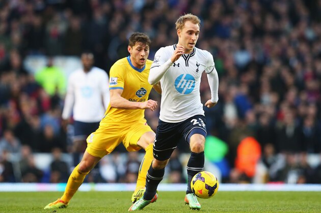 LONDON, ENGLAND - JANUARY 11: Christian Eriksen of Tottenham Hotspur is closed down by Joel Ward of Crystal Palace during the Barclays Premier League match between Tottenham Hotspur and Crystal Palace at White Hart Lane on January 11, 2014 in London, England.  (Photo by Julian Finney/Getty Images)