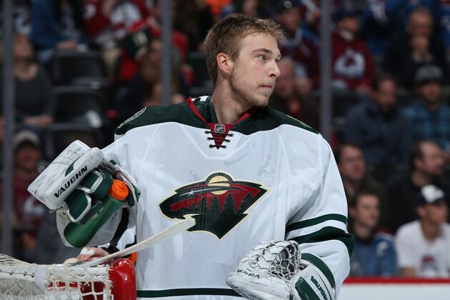 DENVER, CO - APRIL 26:  Goalie Darcy Kuemper #35 of the Minnesota Wild looks on during a break in the action against the Colorado Avalanche Game Five of the First Round of the 2014 NHL Stanley Cup Playoffs at Pepsi Center on April 26, 2014 in Denver, Colorado. The Avalanche defeated the Wild 4-3 in overtime to take a 3-2 game lead in the series.  (Photo by Doug Pensinger/Getty Images)