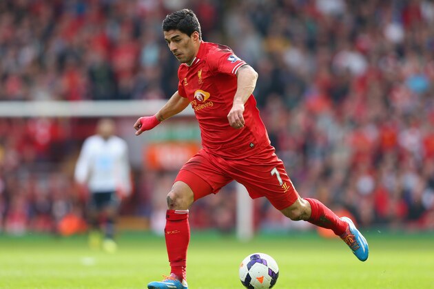 LIVERPOOL, ENGLAND - MARCH 30:  Luis Suarez of Liverpool in action during the Barclays Premier League match between Liverpool and Tottenham Hotspur at Anfield on March 30, 2014 in Liverpool, England.  (Photo by Alex Livesey/Getty Images)