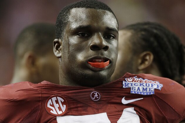 Alabama offensive linesman Cyrus Kouandjio (71) is pictured in the second half of an NCAA college football game against Virginia Tech in Atlanta Saturday, Aug. 31, 2013. Alabama beat Virginia Tech 35-10. (AP Photo/Dave Martin)