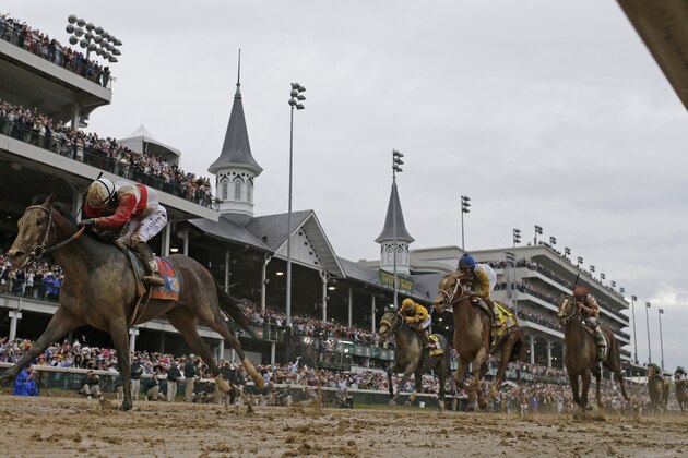 Joel Rosario rides Orb to victory during the 139th Kentucky Derby at Churchill Downs Saturday, May 4, 2013, in Louisville, Ky. (AP Photo/David J. Phillip)