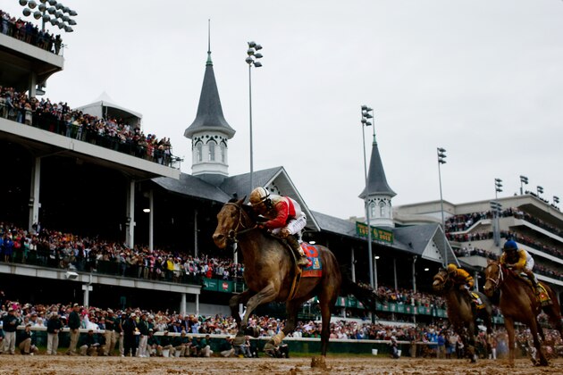 LOUISVILLE, KY - MAY 04:  Joel Rosario atop Orb on his way to winning the 139th running of the Kentucky Derby at Churchill Downs on May 4, 2013 in Louisville, Kentucky.  (Photo by Rob Carr/Getty Images)