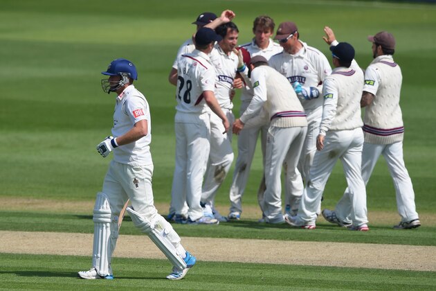 HOVE, ENGLAND - APRIL 29:  Somerset players congratulate Lewis Gregory for bowling James Anyon of Sussex during the LV County Championship match between Sussex and Somerset at BrightonandHoveJobs.com County Ground on April 29, 2014 in Hove, England.  (Photo by Mike Hewitt/Getty Images)