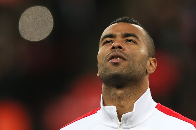 England's Ashley Cole lines up to play against Germany in the international friendly soccer match between England and Germany, at Wembley Stadium in London, Tuesday, Nov. 19, 2013. (AP Photo/Alastair Grant)