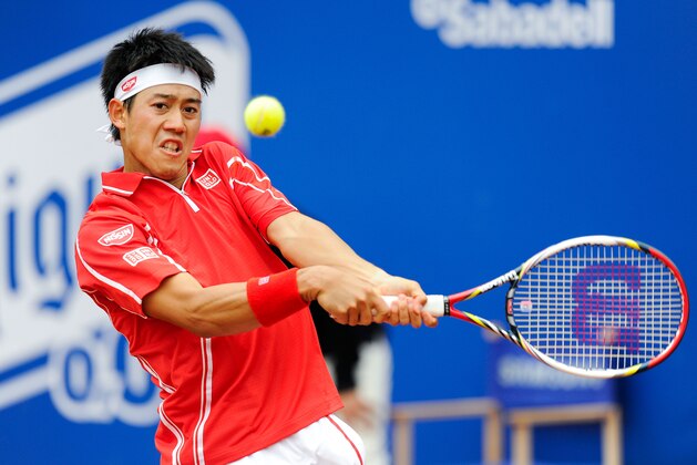 BARCELONA, SPAIN - APRIL 26: Kei Nishikori of Japan returns the ball against Albert Ramos of Spain during day five of the 2013 Barcelona Open Banc Sabadell on April 26, 2013 in Barcelona, Spain. Kei Nishikori lost 4-6, 6-7. (Photo by David Ramos/Getty Images) BARCELONA, SPAIN - APRIL 26: Kei Nishikori of Japan returns the ball against Albert Ramos of Spain during day five of the 2013 Barcelona Open Banc Sabadell on April 26, 2013 in Barcelona, Spain. Kei Nishikori lost 4-6, 6-7. (Photo by David Ramos/Getty Images)