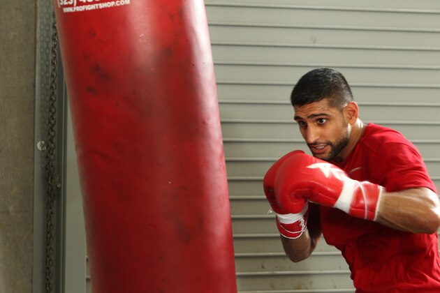HAYWARD, CA - APRIL 24:  Amir Khan in action during a workout session at Virgil Hunter's Gym on April 24, 2014 in Hayward, California. Kahn is preparing to take on Luis Collazo at the MGM Grand in Las Vegas on May 3, 2014. (Photo by Alexis Cuarezma/Getty Images)