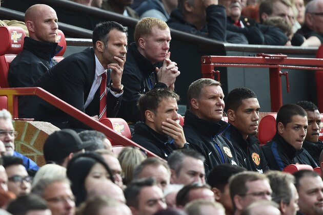 MANCHESTER, ENGLAND - APRIL 26:  Ryan Giggs of Manchester United looks on from the dug out during the Barclays Premier League match between Manchester United and Norwich City at Old Trafford on April 26, 2014 in Manchester, England.  (Photo by Laurence Griffiths/Getty Images)
