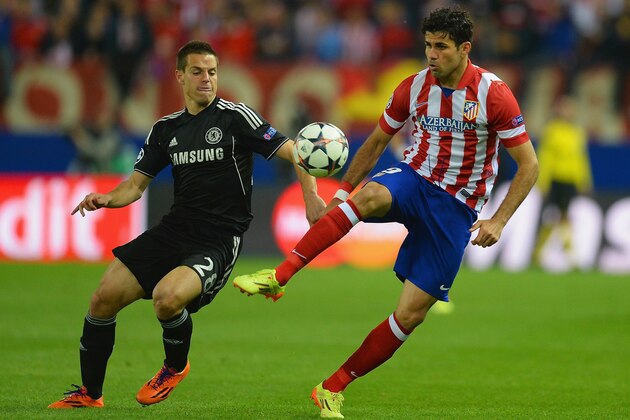 MADRID, SPAIN - APRIL 22:  Cesar Azpilicueta of Chelsea marshalls Diego Costa of Club Atletico de Madrid during the UEFA Champions League Semi Final first leg match between Club Atletico de Madrid and Chelsea at Vicente Calderon Stadium on April 22, 2014 in Madrid, Spain.  (Photo by Mike Hewitt/Getty Images)