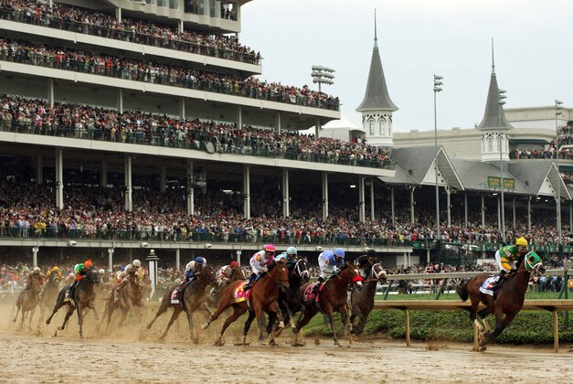 May 4, 2013; Louisville, KY, USA; Mike Smith aboard Palace Malice (10) leads the field around the first turn during the 2013 Kentucky Derby at Churchill Downs. Mandatory Credit: Brian Spurlock-USA TODAY Sports