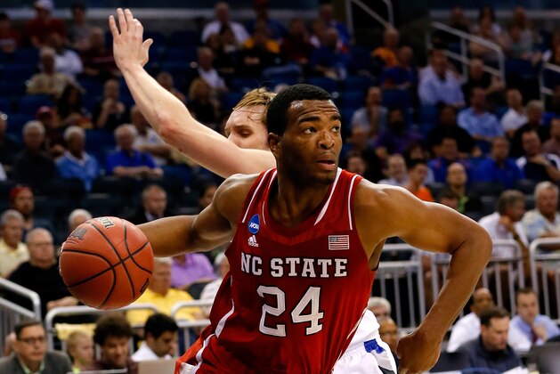 North Carolina State forward T.J. Warren drives against Xavier in the first half of a first-round game of the NCAA college basketball tournament, Tuesday, March 18, 2014, in Dayton, Ohio. (AP Photo/Skip Peterson)