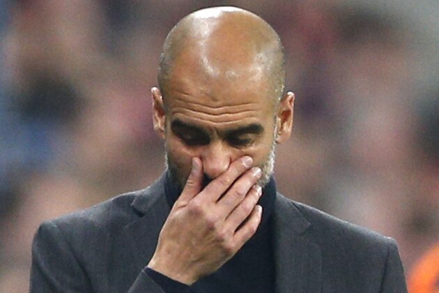 Bayern head coach Pep Guardiola touches his face during the Champions League semifinal second leg soccer match between Bayern Munich and Real Madrid at the Allianz Arena in Munich, southern Germany, Tuesday, April 29, 2014. (AP Photo/Matthias Schrader) Bayern head coach Pep Guardiola touches his face during the Champions League semifinal second leg soccer match between Bayern Munich and Real Madrid at the Allianz Arena in Munich, southern Germany, Tuesday, April 29, 2014. (AP Photo/Matthias Schrader)