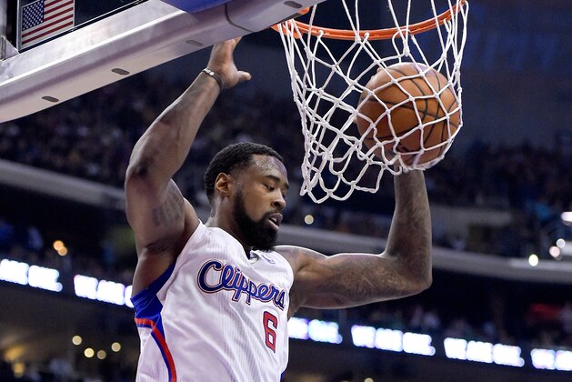 Los Angeles Clippers center DeAndre Jordan dunks against the Golden State Warriors during the first half in Game 5 of an opening-round NBA basketball playoff series, Tuesday, April 29, 2014, in Los Angeles. (AP Photo)