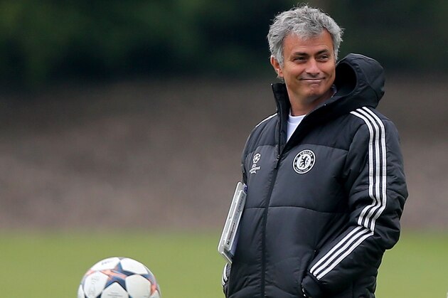 COBHAM, ENGLAND - APRIL 29:  Jose Mourinho of Chelsea looks on during a training session at Chelsea Training Ground on April 29, 2014 in Cobham, England.  (Photo by Clive Rose/Getty Images)