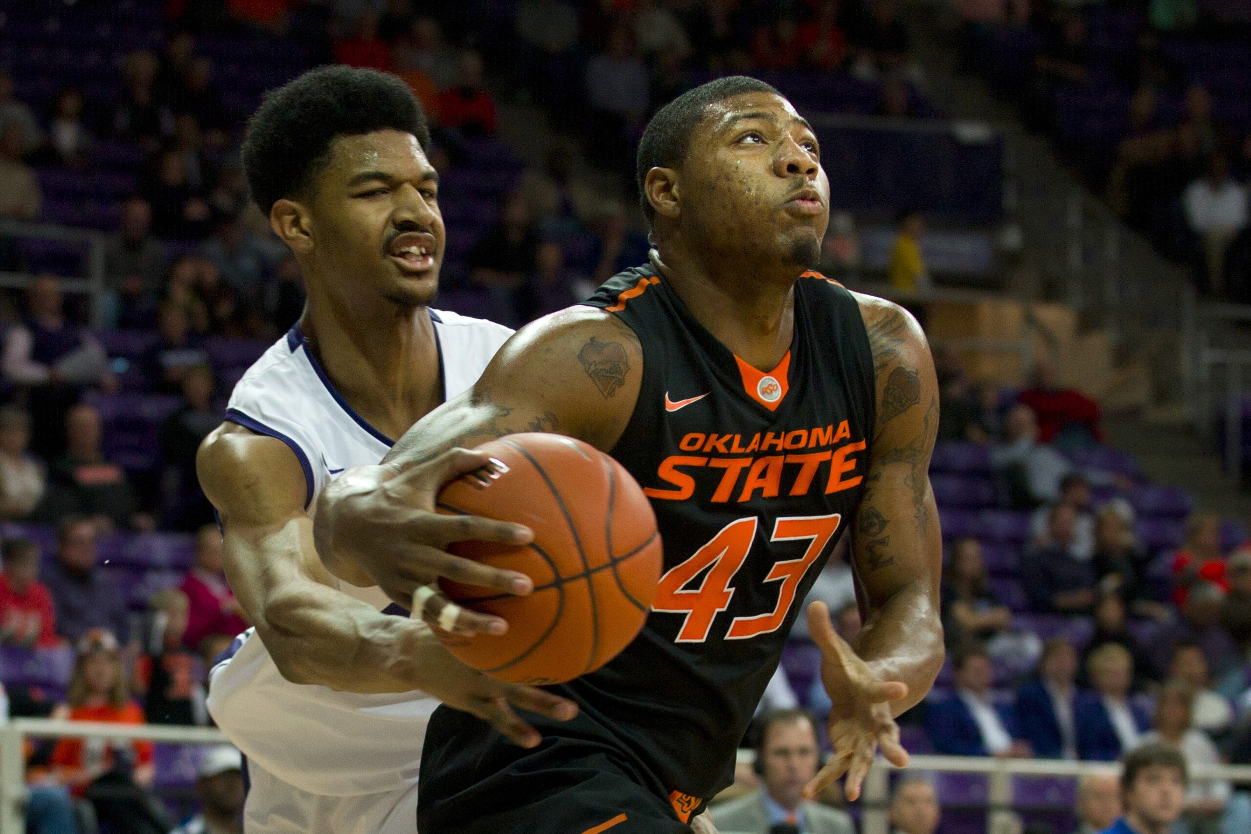 FORT WORTH, TX - FEBRUARY 24: Marcus Smart #43 of the Oklahoma State Cowboys drives to the basket against the TCU Horned Frogs on February 24, 2014 at Daniel-Meyer Coliseum in Fort Worth, Texas. (Photo by Cooper Neill/Getty Images) FORT WORTH, TX - FEBRUARY 24: Marcus Smart #43 of the Oklahoma State Cowboys drives to the basket against the TCU Horned Frogs on February 24, 2014 at Daniel-Meyer Coliseum in Fort Worth, Texas. (Photo by Cooper Neill/Getty Images)