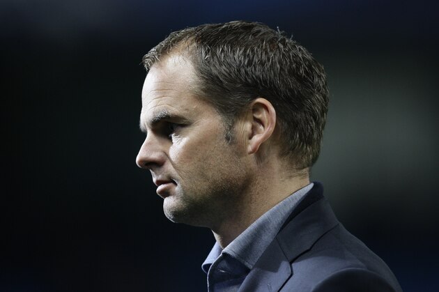 Ajax's manager Frank de Boer is interviewed before his team's  Champions League Group D soccer match against Manchester City at the Etihad Stadium, Manchester, England, Tuesday, Nov. 6, 2012. (AP Photo/Jon Super)