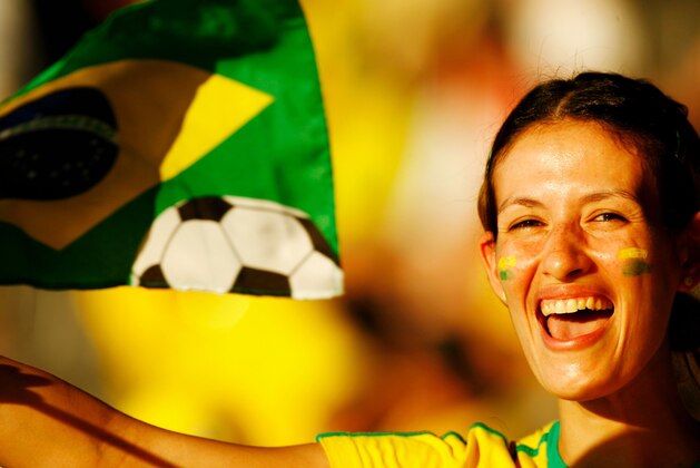BERLIN - JUNE 13:  A Brazilian fan enjoys the sunshine prior to the FIFA World Cup Germany 2006 Group F match between Brazil and Croatia played at the Olympic Stadium on June 13, 2006 in Berlin, Germany.  (Photo by Clive Mason/Getty Images)