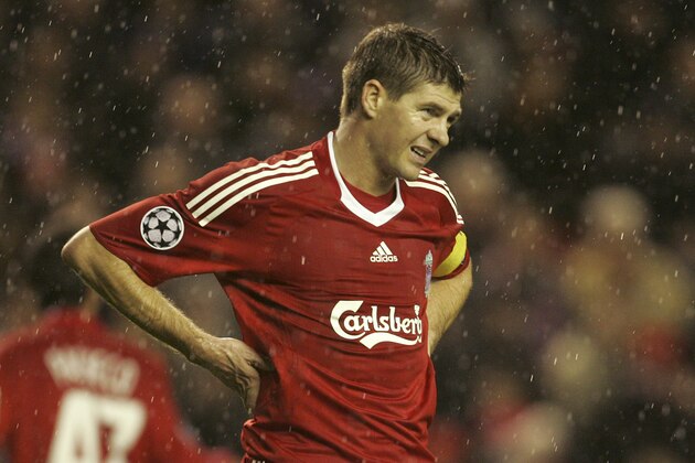 Liverpool's Steven Gerrard reacts against Fiorentina during their Champions League group E soccer match at Anfield Stadium, Liverpool, England, Wednesday Dec. 9, 2009. (AP Photo/Tim Hales)