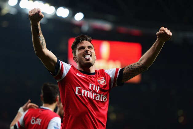 LONDON, ENGLAND - APRIL 28:  Olivier Giroud of Arsenal celebrates as he scores their third goal during the Barclays Premier League match between Arsenal and Newcastle United at Emirates Stadium on April 28, 2014 in London, England.  (Photo by Jamie McDonald/Getty Images)