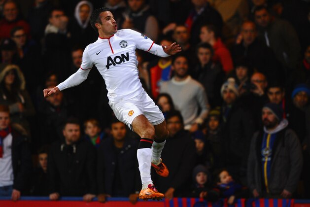 LONDON, ENGLAND - FEBRUARY 22:  Robin Van Persie of Manchester United jumps for joy as he celebrates the first goal during the Barclays Premier League match between Crystal Palace and Manchester United at Selhurst Park on February 22, 2014 in London, England.  (Photo by Laurence Griffiths/Getty Images)