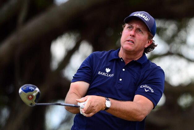Mar 9, 2014; Miami, FL, USA; Phil Mickelson tees off from the 5th hole during the final round of the WGC - Cadillac Championship golf tournament at TPC Blue Monster at Trump National Doral. Mandatory Credit: Andrew Weber-USA TODAY Sports