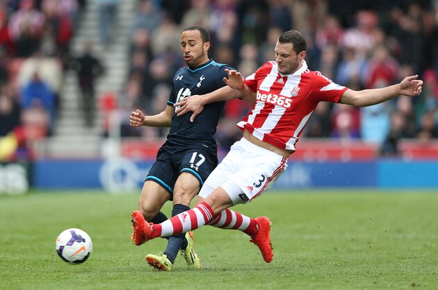 STOKE ON TRENT, ENGLAND - APRIL 26: Erik Pieters of Stoke City in action with Andros Townsend of Tottenham Hotspur during the Barclays Premier League match between Stoke City and Tottenham Hotspur at the Britannia Stadium on April 26, 2014 in Stoke on Trent, England.  (Photo by Clive Brunskill/Getty Images)