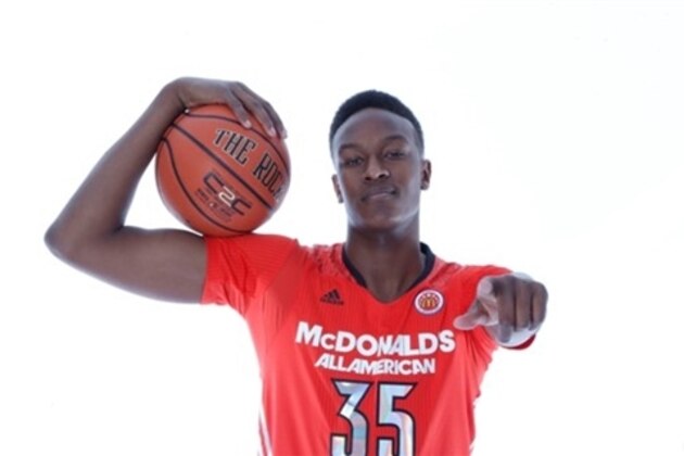 McDonald's East All-American Myles Turner, of Bedford, Texas, competes in the three-point shootout during the McDonald's All-American Jam Fest at the University of Chicago in Chicago, on Monday, March 31, 2014. (AP Photo/Andrew A. Nelles)