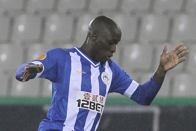Wigan Athletic Marc-Antoine Fortune takes the ball, during the Europa League group stages in group D against Zulte-Waregem, at the Jan Breydel stadium in Bruges, Belgium, Thursday, Sept. 19, 2013. (AP Photo/Yves Logghe)