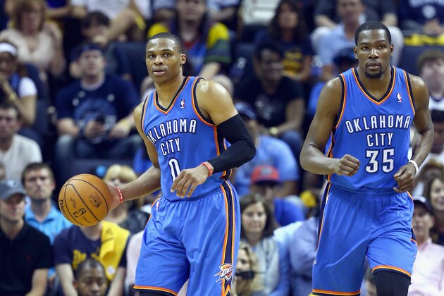 MEMPHIS, TN - APRIL 26:  Russell Westbrook #0 of the Oklahoma City Thunder and Kevin Durant #35 come up the floor together during the game against the Memphis Grizzlies in Game 4 of the Western Conference Quarterfinals during the 2014 NBA Playoffs at FedExForum on April 26, 2014 in Memphis, Tennessee. NOTE TO USER: User expressly acknowledges and agrees that, by downloading and or using this photograph, User is consenting to the terms and conditions of the Getty Images License Agreement.  (Photo by Andy Lyons/Getty Images)
