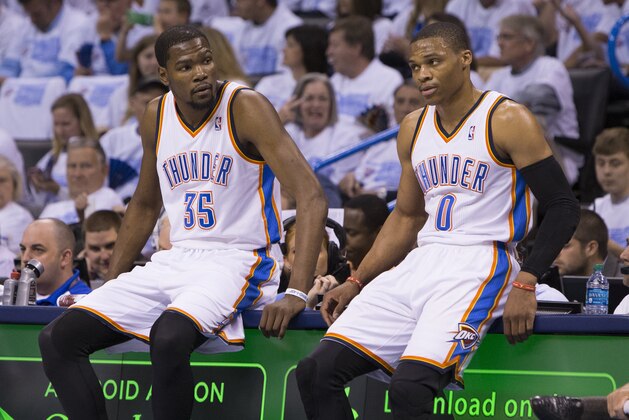 OKLAHOMA CITY, OK - April 29, 2014:  (L-R) Kevin Durant #35 and Russell Westbrook #0 of the Oklahoma City Thunder during the game against the Memphis Grizzlies in Game 5 of the Western Conference Quarterfinals during the 2014 NBA Playoffs at the Chesapeake Arena on April 29, 2014 in Oklahoma City, Oklahoma. NOTE TO USER:  User expressly acknowledges and agrees that, by downloading and/or using this photograph, user is consenting to the terms and conditions of the Getty Images License Agreement. Mandatory Copyright Notice:  Copyright 2014 NBAE (Photo by Richard Rowe/NBAE via Getty Images)