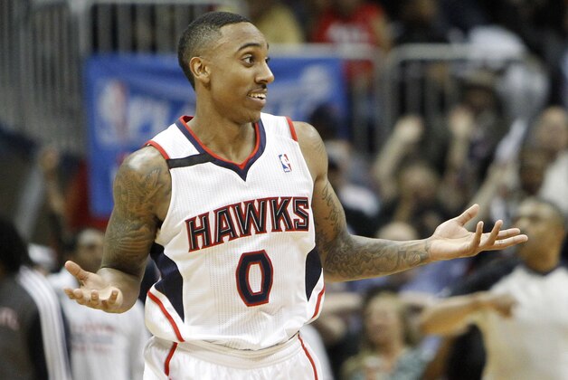Apr 24, 2014; Atlanta, GA, USA; Atlanta Hawks guard Jeff Teague (0) shows emotion after making a shot against the Indiana Pacers in the fourth quarter in game three of the first round of the 2014 NBA Playoffs at Philips Arena. The Hawks defeated the Pacers 98-85. Mandatory Credit: Brett Davis-USA TODAY Sports