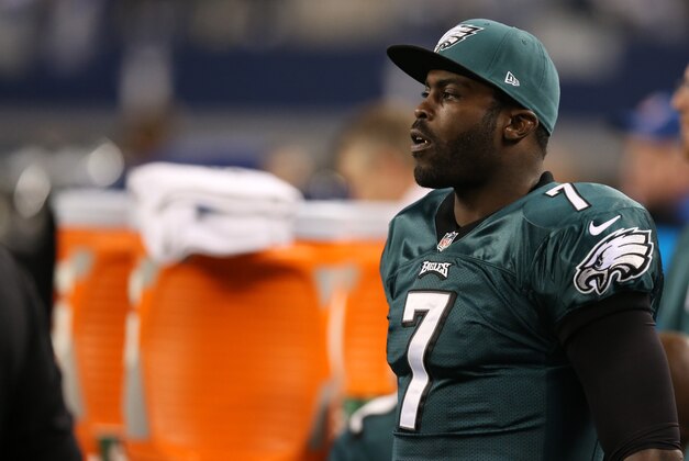 Dec 29, 2013; Arlington, TX, USA; Philadelphia Eagles quarterback Michael Vick (7) on the bench during the game against the Dallas Cowboys at AT&T Stadium. Mandatory Credit: Matthew Emmons-USA TODAY Sports