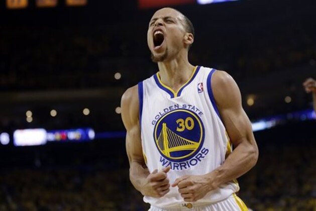 FILE - In this April 27, 2014, file photo, Golden State Warriors' Stephen Curry celebrates after scoring against the Los Angeles Clippers during the first half in Game 4 of an opening-round NBA basketball playoff series  in Oakland, Calif.
