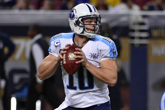 Nov 3, 2013; St. Louis, MO, USA; Tennessee Titans quarterback Jake Locker (10) looks to pass against the St. Louis Rams during the first half at the Edward Jones Dome. Mandatory Credit: Scott Rovak-USA TODAY Sports Nov 3, 2013; St. Louis, MO, USA; Tennessee Titans quarterback Jake Locker (10) looks to pass against the St. Louis Rams during the first half at the Edward Jones Dome. Mandatory Credit: Scott Rovak-USA TODAY Sports