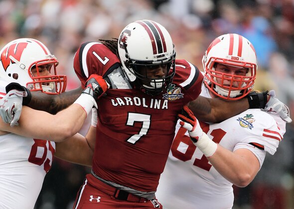 ORLANDO, FL - JANUARY 01:  Jadeveon Clowney #7 of the South Carolina Gamecocks in action during their game against the Wisconsin Badgers at the Capital One Bowl on January 1, 2014 in Orlando, Florida.  (Photo by Scott Halleran/Getty Images)