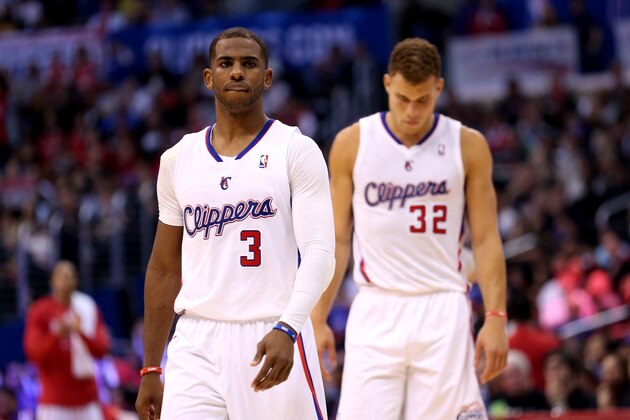 LOS ANGELES, CA - APRIL 29:  Chris Paul #3 and Blake Griffin #32 of the Los Angeles Clippers walk onto the floor after a time out against the Golden State Warriors in Game Five of the Western Conference Quarterfinals during the 2014 NBA Playoffs at Staples Center on April 29, 2014 in Los Angeles, California.  The Clippers won 113-103.   NOTE TO USER: User expressly acknowledges and agrees that, by downloading and or using this photograph, User is consenting to the terms and conditions of the Getty Images License Agreement.  (Photo by Stephen Dunn/Getty Images)