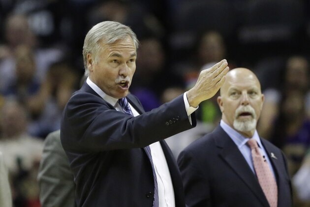 Los Angeles head coach Mike D'Antoni during the first half of an NBA basketball game against the San Antonio Spurs, Wednesday, April 16, 2014, in San Antonio. Los Angeles won 113-100. (AP Photo/Eric Gay)