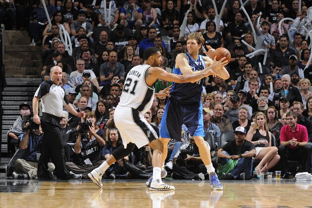 SAN ANTONIO, TX - April 30: Dirk Nowitzki #41 of the Dallas Mavericks handles the ball against the San Antonio Spurs in Game Five of the Western Conference Quarterfinals during the NBA Playoffs at AT&T Center on April 30, 2014 in San Antonio, Texas. NOTE TO USER: User expressly acknowledges and agrees that, by downloading and or using this photograph, user is consenting to the terms and conditions of the Getty Images License Agreement. Mandatory Copyright Notice: Copyright 2014 NBAE (Photos by D. Clarke Evans/NBAE via Getty Images)