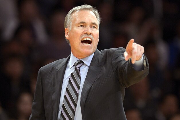 FILE - In this Feb. 28, 2014, file photo, Los Angeles Lakers head coach Mike D'Antoni gestures during the second half of an NBA basketball game against the Sacramento Kings in Los Angeles. Lakers spokesman John Black confirmed D'Antoni's resignation Wednesday, April 30. (AP Photo/Mark J. Terrill, File)