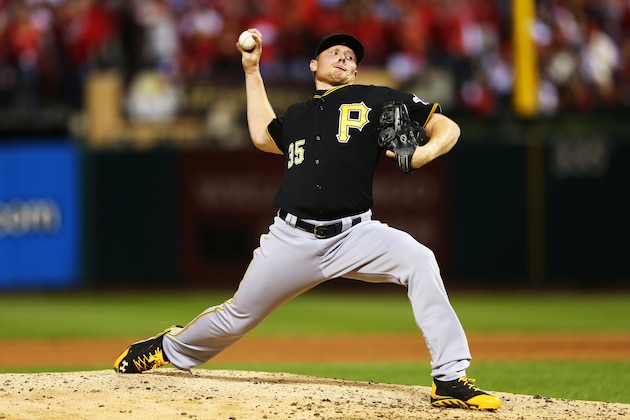 ST LOUIS, MO - OCTOBER 09:  Mark Melancon #35 of the Pittsburgh Pirates pitches in the eighth inning against the St. Louis Cardinals during Game Five of the National League Division Series at Busch Stadium on October 9, 2013 in St Louis, Missouri.  (Photo by Elsa/Getty Images)