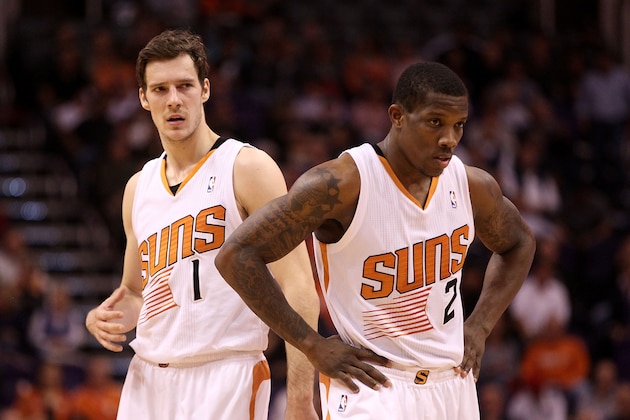 PHOENIX, AZ - DECEMBER 18:  Goran Dragic #1 and Eric Bledsoe #2 of the Phoenix Suns await a free throw shot during the NBA game against the San Antonio Spurs at US Airways Center on December 18, 2013 in Phoenix, Arizona. The Spurs defeated the 108-101.  NOTE TO USER: User expressly acknowledges and agrees that, by downloading and or using this photograph, User is consenting to the terms and conditions of the Getty Images License Agreement.  (Photo by Christian Petersen/Getty Images)