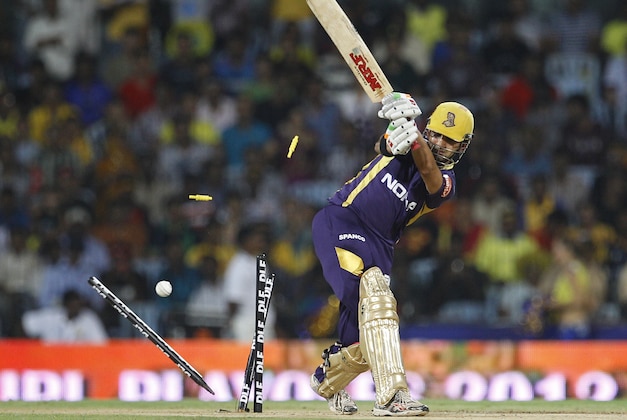 Kolkata Knight Riders captain Gautam Gambhir is bowled out by Chennai Super Kings' bowler Ben Hilfenhaus, not seen, during their Indian Premier League (IPL) final cricket match in Chennai, India, Sunday, May 27, 2012.  (AP Photo/Aijaz Rahi)